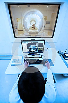 Veterinarian doctor with MRI computer control photo