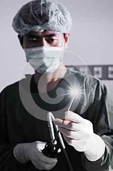 Veterinarian doctor in operation room for laparoscopic surgical (art lighting shot)