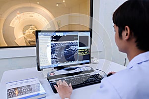 Veterinarian doctor working in MRI room