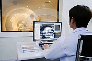 Veterinarian doctor working in MRI room