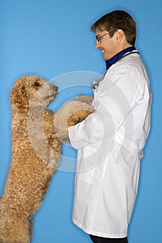 Veterinarian with dog.