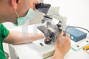 Veterinarian examining samples