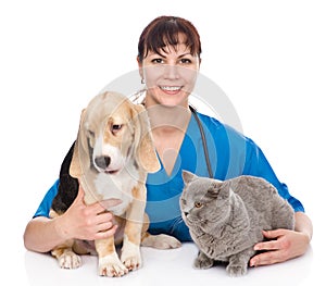 Veterinarian hugging cat and dog. on white background