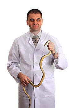 Veterinarian with a snake in his hands