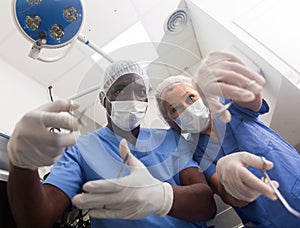 Veterinarians with equipment in a veterinary clinic