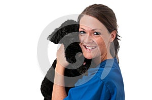 Veterinary Assistant Holding Pet Dog Isolated