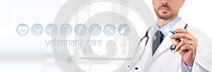 Veterinary doctor touch screen with pen vet symbols icons on background. Vet clinic care concept photo