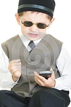 Vexed kid with palm computer and stylus