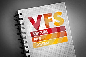 VFS - Virtual File System acronym on notepad, technology concept background