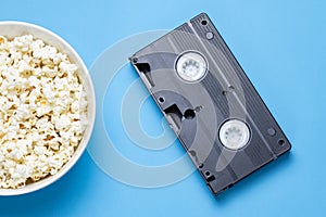 VHS tape and bowl of popcorn