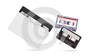 VHS video tape and audiocassette isolated on white