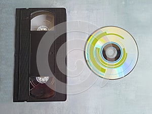 VHS video tape with dvd cd. Compact Disc. Top view, space for text. photo