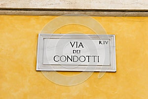 Via Dei Condotti Street Sign in Rome, Italy photo