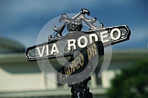 Via Rodeo street sign