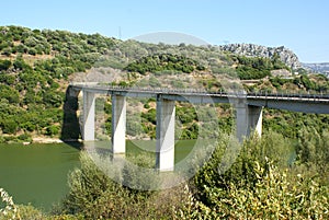 Viaduct bridge over the Lake Cedrino in Dorgali, Sardinia Italy