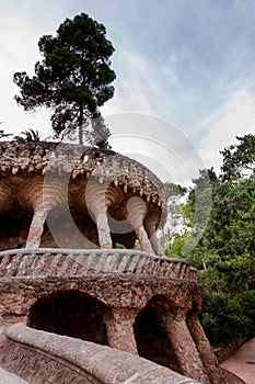 Viaducto and tree in Park Guell at Barcelona photo