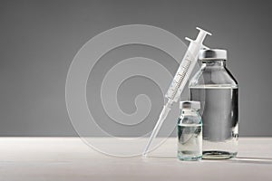 Vial, bottle and syringe photo