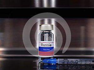 Vial of covid-19 vaccine with a flag label of Russia