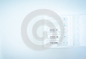 Vial of covid19 vaccine on tray