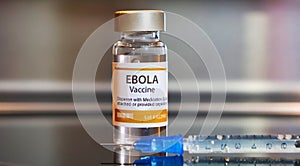 Vial  of Ebola vaccine with a syringe