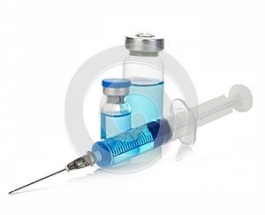 Vials with blue medication solution, ampoules, and syringe isolated on a white background.