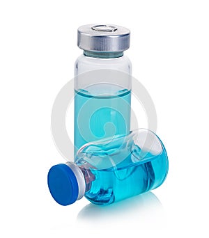 Vials with blue solution isolated on a white background.