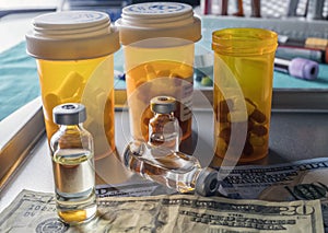 Vials with different substances over dollar