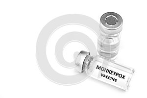 Vials filled with Monkeypox vaccine on white background