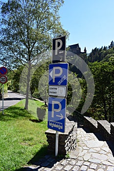 Vianden, Luxembourg - 08 10 2023: Free parking sign in front of the castle