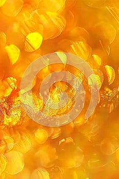 Vibrant abstract gradient light bokeh in yellow, orange, and red tones for dynamic background