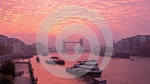 Vibrant altocumulus sunrise cloud above the River Thames in London, England