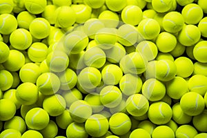 Vibrant assortment of tennis balls on a seamless green background pattern for sports themed designs