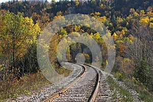 Vibrant autumn colors with railroad track at Credit River Valley in Caledon, Ontario, Canada photo