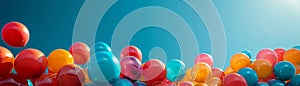 Vibrant balloons against a backdrop of a clear blue sky