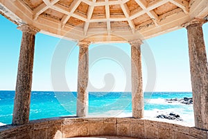 Ancien temple with greece colum by the mediterranean sea photo