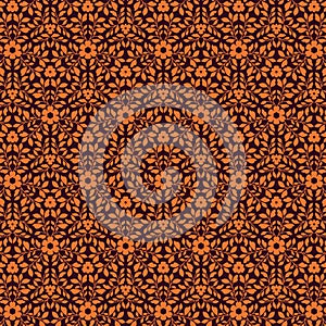 Vibrant botanical pattern with orange silhouette floral motifs isolated on a dark brown background