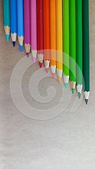 Vibrant Colored Pencils Arranged in Gradient