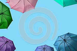 Vibrant colorful opened umbrellas background
