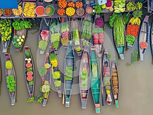 Vibrant Floating Market: Aerial View of Colorful Produce