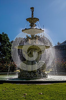 Vibrant fountain in front of the iconic Royal Exhibition Building in Melbourne, Australia