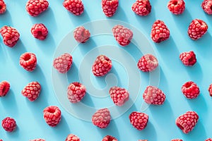 Vibrant Fresh Raspberries on a Blue Background - Fruit Pattern