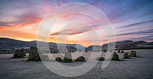 Vibrant frosty winter sunset at Castlerigg stone circle