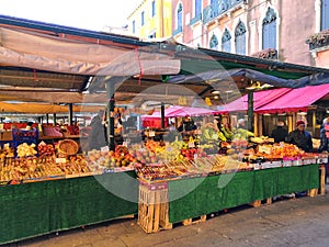 Vibrant fruit and vegetable stall in a street market in Venice, Italy