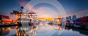 The vibrant harbor scene showcasing shipping containers and cranes at sunset. AI generated image