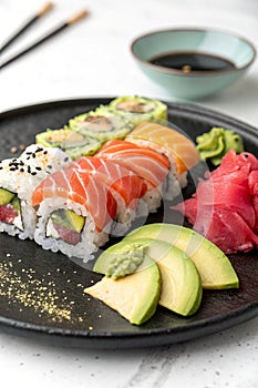 Image of sushi on a black plate