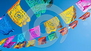 Vibrant Mexican papel picado fluttering against a clear blue sky. Cinco de Mayo banner. AI Generated