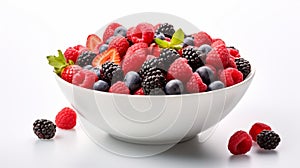 A vibrant mix of fresh berries in a white bowl against a white background