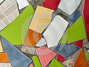 Vibrant Mosaic Artwork Displaying Assemblage of Colored Tiles. Array of brightly colored and textured tiles arranged photo