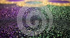 Vibrant multicolored sparkling glitter texture creating a dazzling bokeh light effect abstract