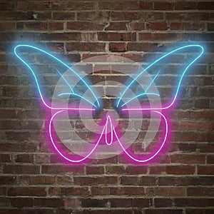 Vibrant Neon Butterfly on Weathered Brick Wall